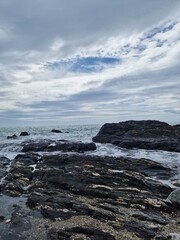 Tranquil Coastal Waves Against Rocky Shore