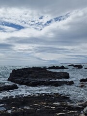 Tranquil Coastal Waves Against Rocky Shore