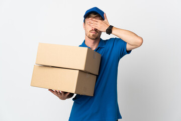 Young delivery blonde man isolated on white background covering eyes by hands. Do not want to see...