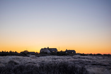 Fototapeta premium cottages in denmark at sunrise