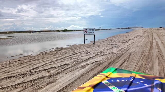 Buggy tour on the Avenida Beira Mar beach road at Jericoacoara in Brazil. Dunes of Ceara