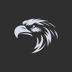 Eagle Head Silhouette logo Against Dark Background