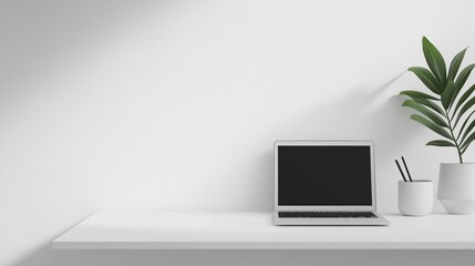 White desk with a laptop on it. the laptop is open and has a blank black screen. next to the laptop, there is a small potted plant with green leaves and a white vase with a pen holder.