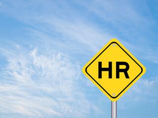 Yellow transportation sign with word HR (Abbreviation of human resource) on blue color sky background