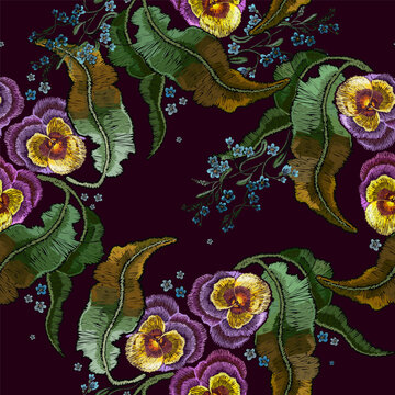 Violet flowers. Embroidery. Seamless pattern. Summer garden art. Fashion template for clothes, textiles. Botanical background