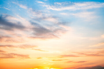 Sky,sunset, beautiful , luxury soft gradient orange gold clouds and sunlight on the blue sky perfect for the background, Sunrise on morning or everning in winter warm time ,Twilight summer,silhouette