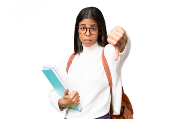 Young African American student woman over isolated background showing thumb down with negative expression