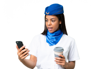 Airplane stewardess African american woman over isolated background holding coffee to take away and a mobile