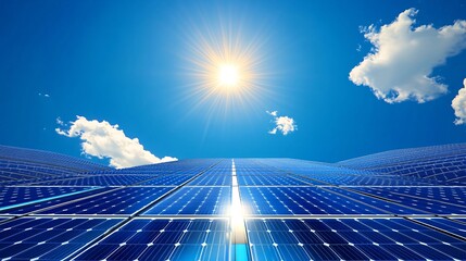Expansive Solar Power Plant Featuring Rows of Aligned Solar Panels Under Clear Blue Sky
