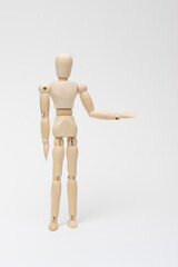 左手をあげて案内するデッサン人形