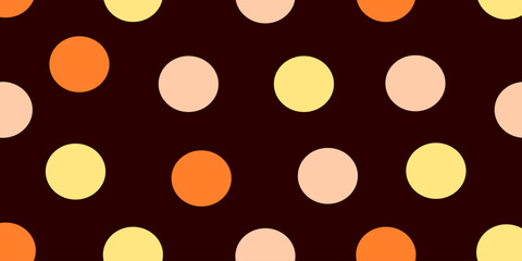 Colorful polka dots in various sizes create playful and vibrant pattern on dark background. combination of orange, yellow, and peach circles adds cheerful touch to any design