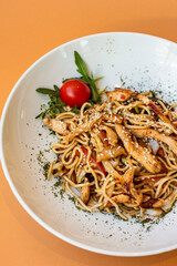 Stir-fried pasta with chicken and vegetables, Noodles with chicken and vegetables