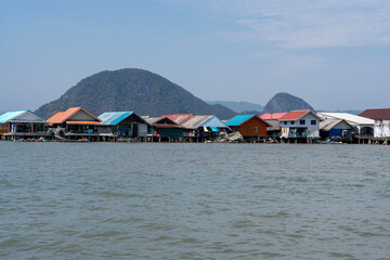 Colorful houses in Ko Panyi or Koh Panyee, fishing village in Strait of Malacca, Phang Nga Province, Thailand, notable for being built on stilts by Javanese fishermen