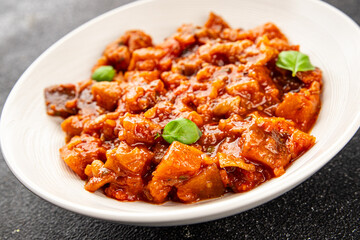 Eggplant stew dish vegetables salad tasty fresh delicious gourmet food background on table rustic food top view copy space keto and paleo diet vegetarian and vegan food