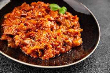 Eggplant stew dish vegetables salad tasty fresh delicious gourmet food background on table rustic food top view copy space keto and paleo diet vegetarian and vegan food