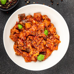 Eggplant stew dish vegetables salad tasty fresh delicious gourmet food background on table rustic food top view copy space keto and paleo diet vegetarian and vegan food