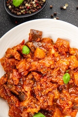 Eggplant stew dish vegetables salad tasty fresh delicious gourmet food background on table rustic food top view copy space keto and paleo diet vegetarian and vegan food