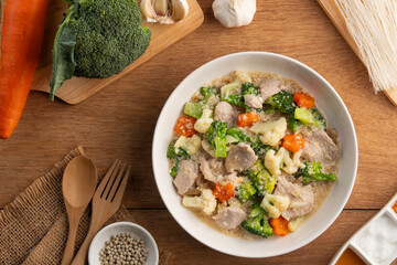 Rad na pork vegetables.Rice Vermicelli Noodles with Pork Cauliflower and broccoli in Gravy Sauce.Thai food.Top view.