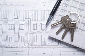 House keys on architectural project plan.