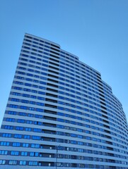 Fototapeta premium A modern apartment building. Urban residential complex. High-rise apartment building