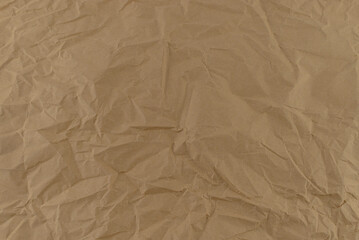 Detailed texture of brown eco-friendly recycled paperboard, close-up view