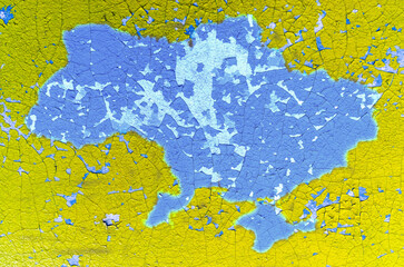 map of Ukraine painted on an old wall with the colors blue and yellow of the flag
