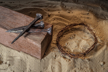 Crown of Thorns associated with the Passion of Jesus Christ. Fragment of a wooden cross symbol of...