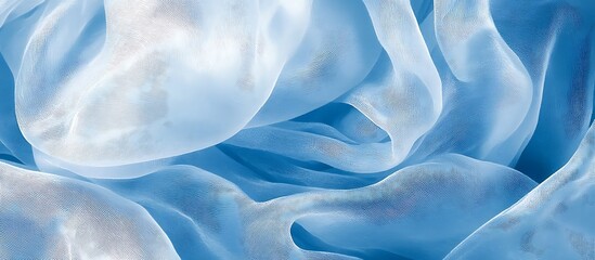Obraz premium Blue silk fabric folds, closeup texture