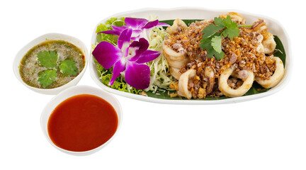 Fried squid with garlic, served with seafood sauce and ketchup.