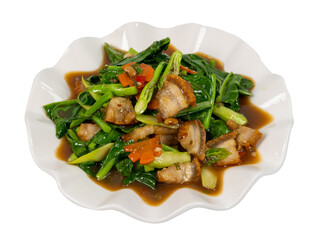 Stir fried crispy pork with kale and oyster sauce in plate 