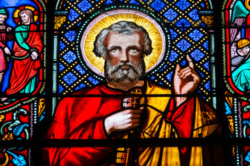 Stained glass (19th century) of Saint Peter the apostle with the keys of the Church.