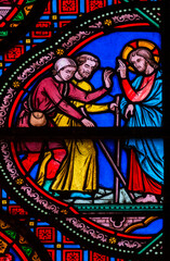 Fototapeta premium Stained glass (19th century) of Jesus-Christ heals a blind man.
