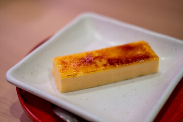 Catalana ice brulee, or a custard topped with a layer of caramelized sugar, similar to the French Creme Brulee