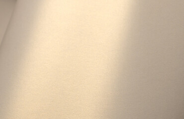 Elegant creamy pearl paper texture with a golden pearlescent gloss and subtle shimmering effect. Rich and reflective designer material with a warm glow, perfect for luxury stationery, artistic.