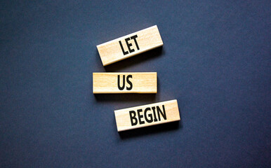 Let us begin symbol. Concept words Let us begin on beautiful wooden blocks. Beautiful black table...