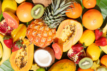 Summer mix of tropical fruits over white