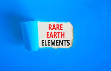 Rare earth elements symbol. Concept words Rare earth elements on beautiful white paper. Beautiful blue paper background. Business and rare earth elements concept. Copy space.