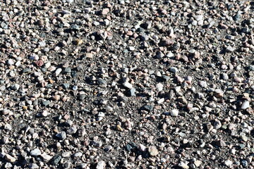 Gravel parking lot closeup.