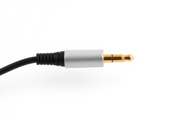 Close-up of a single audio cable against a pure white background, analog, studio shot