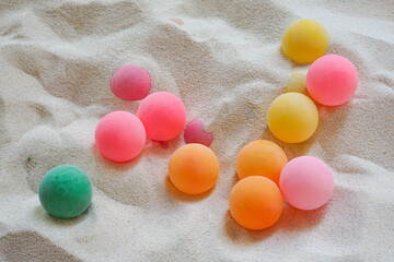 Colorful ball toys in children's sandbox