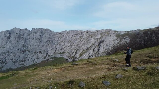 aerial view of hikers hiking in y&iexcl;the mountains of Urkiola Natural Park in the basque country