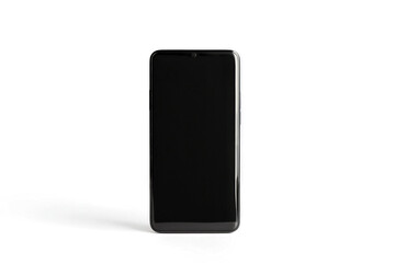 Naklejka premium a black phone on a white surface cutout image and isolated on transparent background 