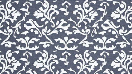 Patterned dark blue fabric background of floral designs, used for textile art