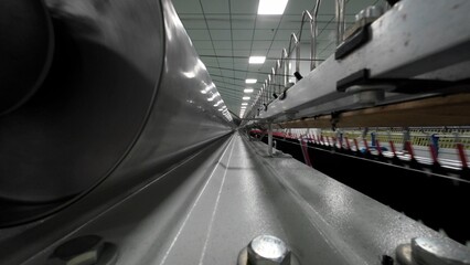 Naklejka premium Warping machines in a woolen sweater factory