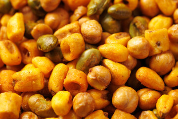 Sweet chilli Crunch protein packed mix of baked corn pieces, edamame beans, chickpeas and corn hoops. Healthy snack concept