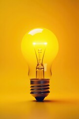 Glowing lightbulb on vibrant yellow background , spark, glow, think