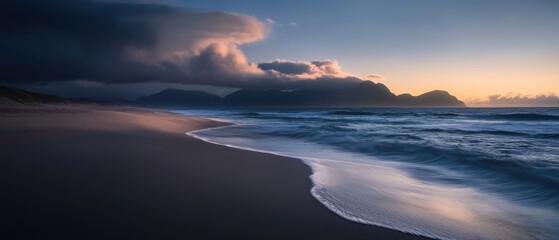 Fototapeta premium Coastal Sunrise, Dramatic Clouds, Calm Beach