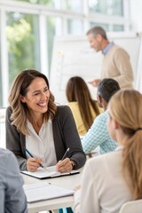 Fototapeta premium Smiling woman actively participating in a seminar, engaging in discussions during a professional training session.