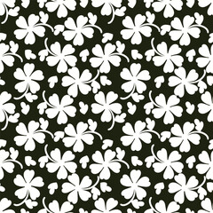 Beautiful flowers decorated semaless pattern on black background.