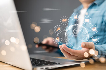 A businessman interacts with a futuristic digital market plan AI management interface, featuring a glowing holographic globe with interconnected analytics icons, symbolizing innovation and strategy.